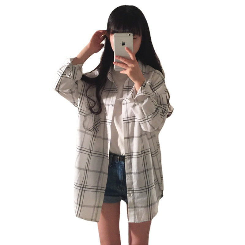 Kvinders stribede overshirt bluse i en afslappet pasform med oversized ærmer