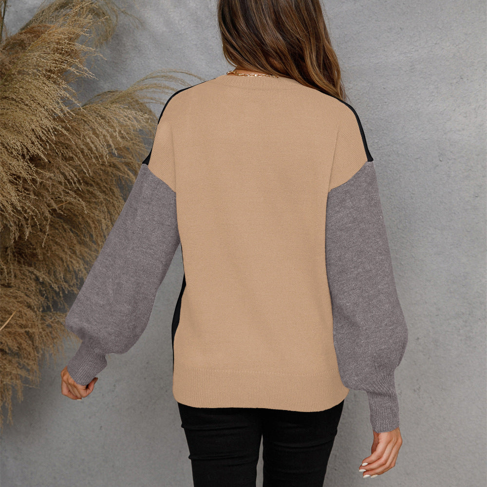 Kvindernes afslappede sweater med knaplukning og kontrasterende ærmer Stilla