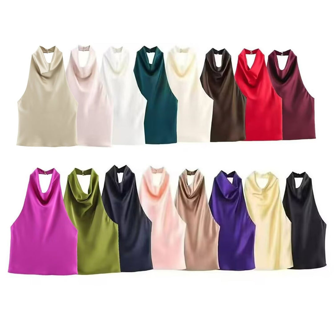 Dame elegant halterneck top med flydende snit og dekorative detaljer Skovae