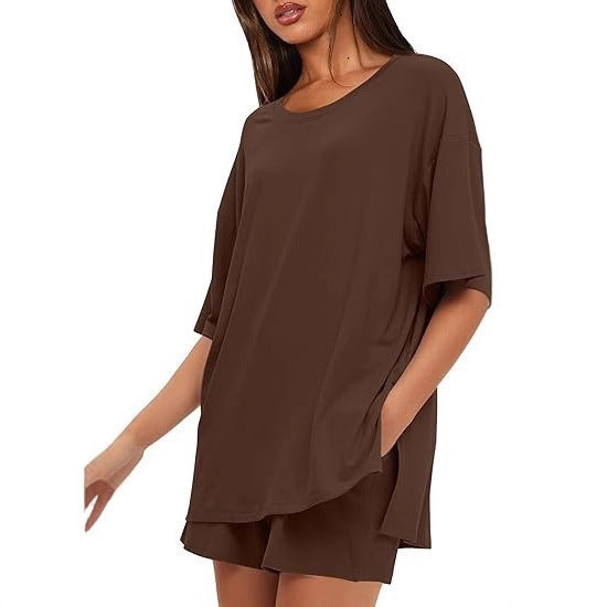 Dame Oversize T-shirt med afslappet snit og sidelange sprækker Skovae