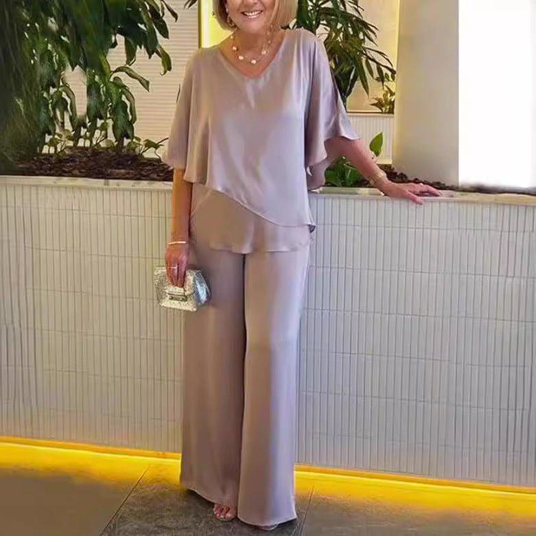 Dame elegant to-delt outfit med flydende snit Stilla