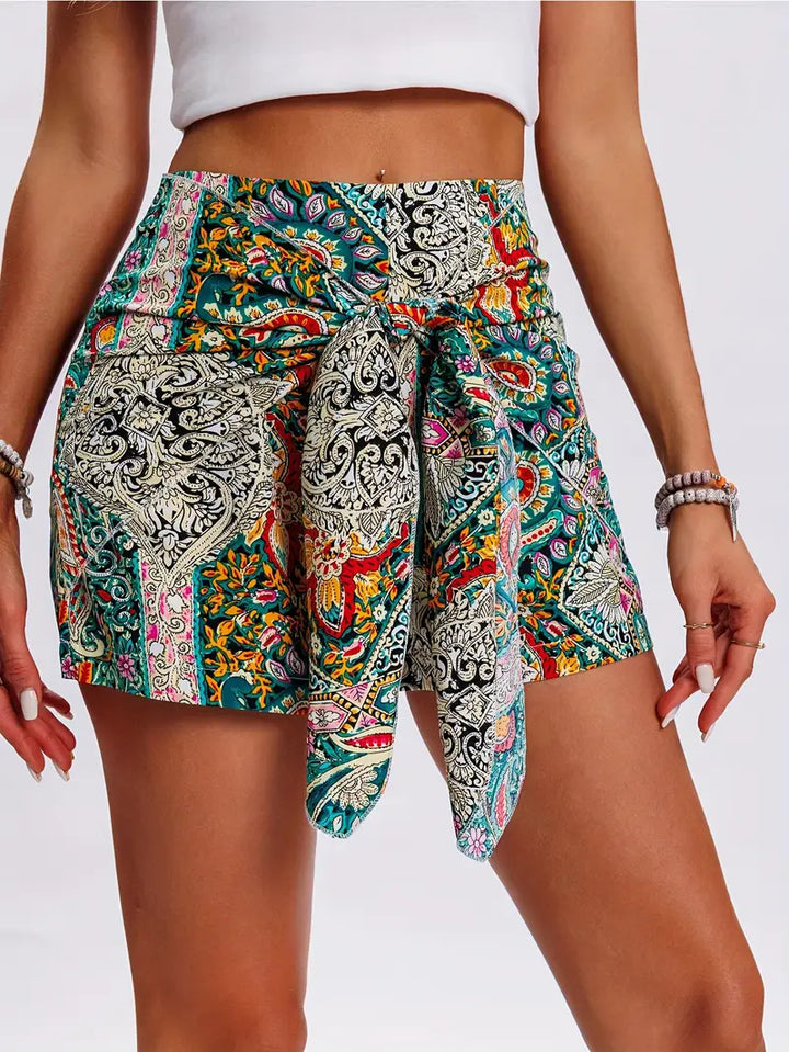 Dame Mode Shorts med farverigt mønster og elegant båndbinding Stilla