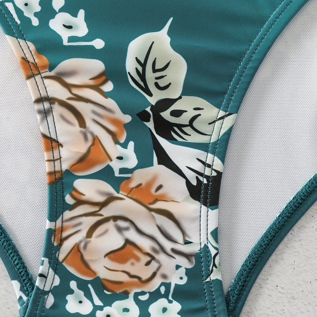 Dame Én-delt Badedragt med elegant skæring og blomstret design Skovae