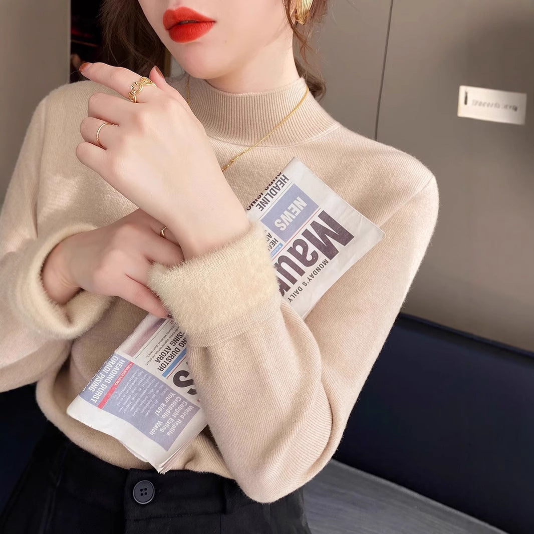 Kvinders kortærmede sweater med en stilfuld turtleneck og afslappet snit Stilla