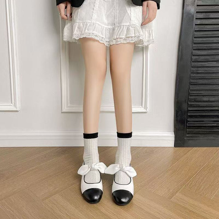 Dame Ballerinas med legende sløjfe-detail og moderigtigt farvekontrast Stilla