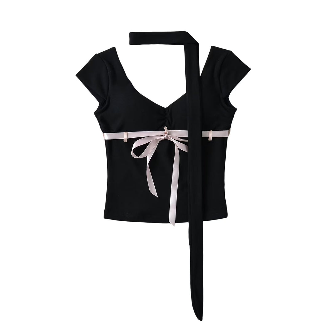 Dame Cut-out top med sødt båndaccent Stilla
