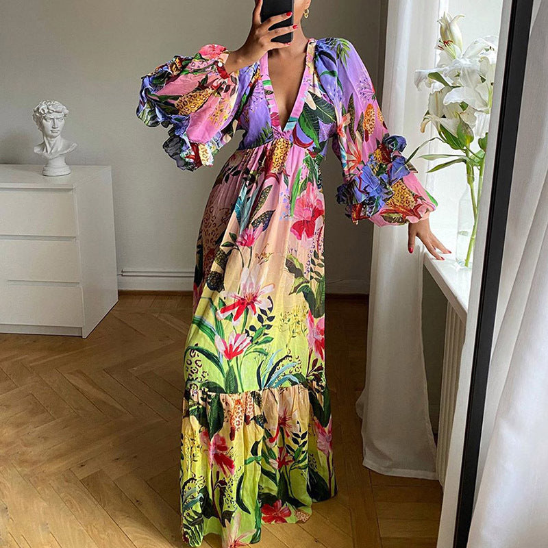 Dame Maxi-kjole med voluminøse flæseærmer og floral design Stilla