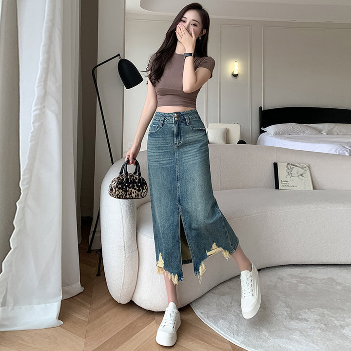 Kvinders lang denimnederdel med sideslids og frynset kant Stilla