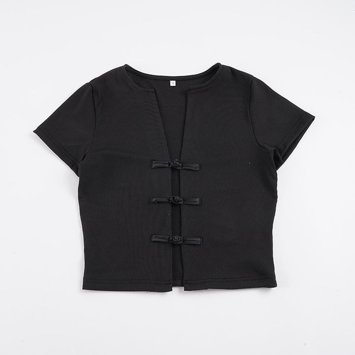 Dame kortærmet top med elegante knapdetaljer Skovae
