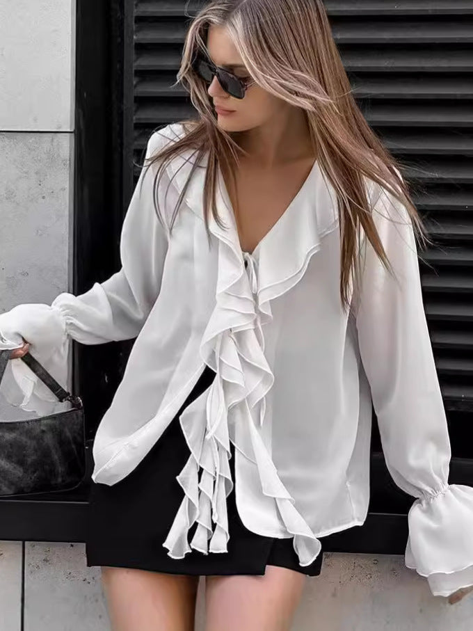Damebluse med volumniøse flæser og elegante ærmer Stilla