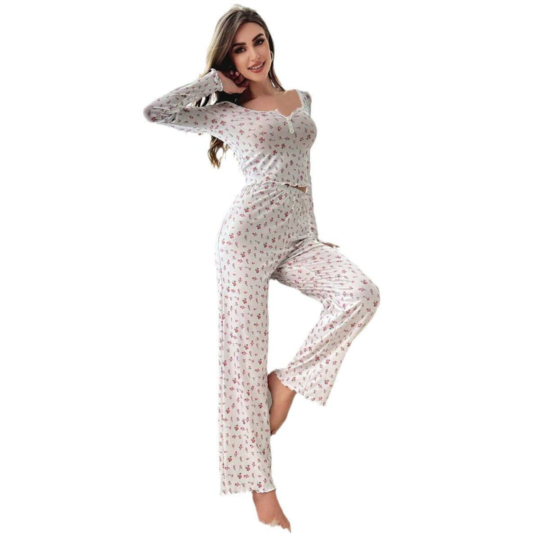 Dame pyjamasæt med blomstermotiv og elegante spidsdetaljer Stilla