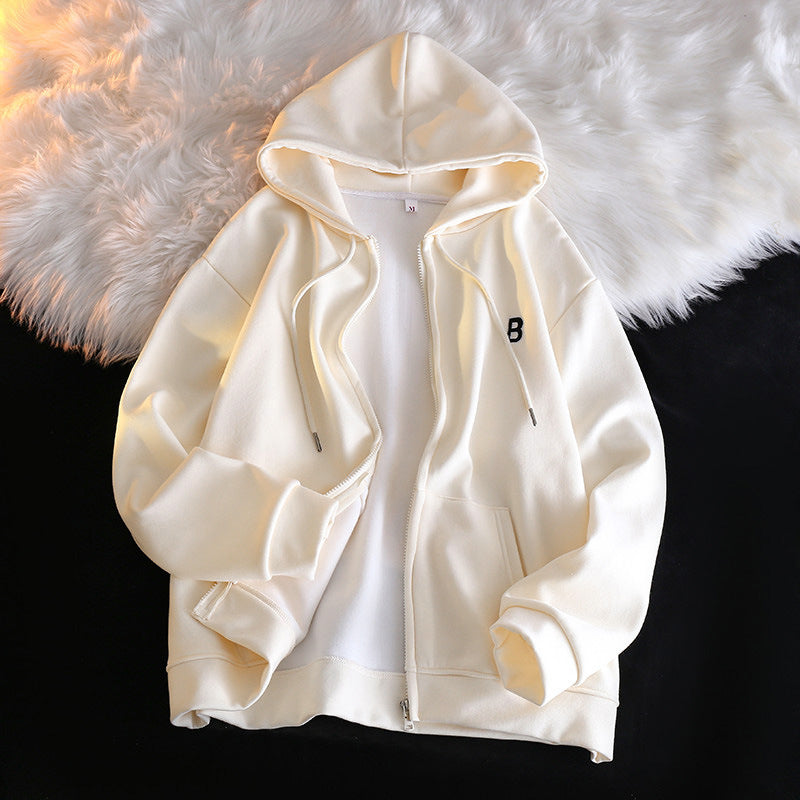Femme Cozy Zip-Up Hoodie med elegant broderet detalje Stilla