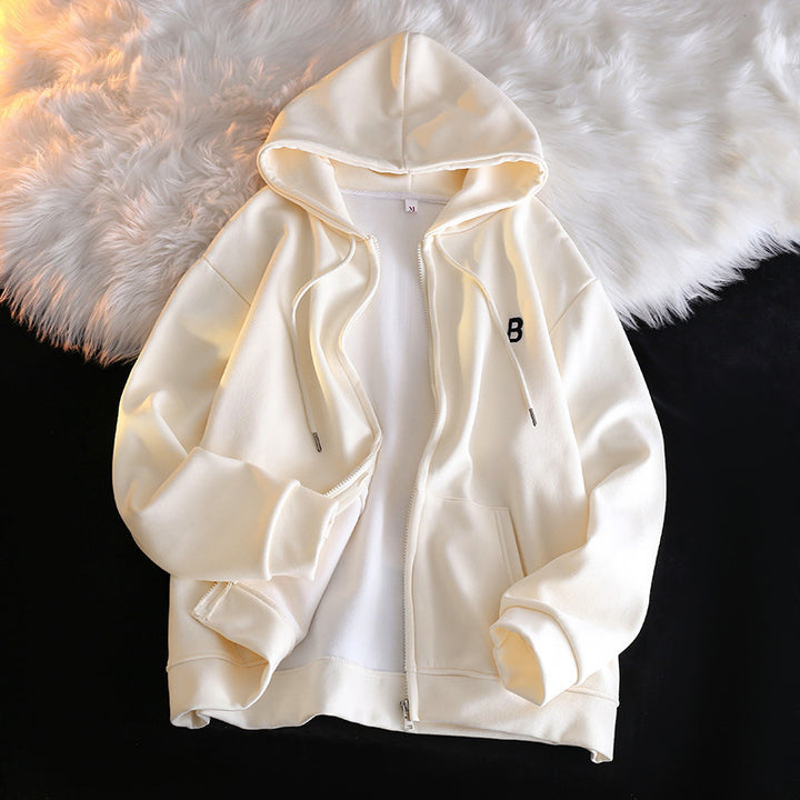 Femme Cozy Zip-Up Hoodie med elegant broderet detalje Stilla