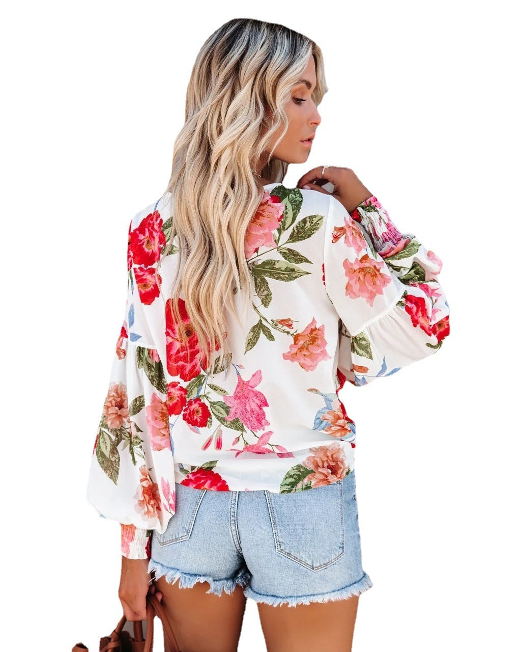 Damebluse med blomstertrykt og lange ærmer Stilla