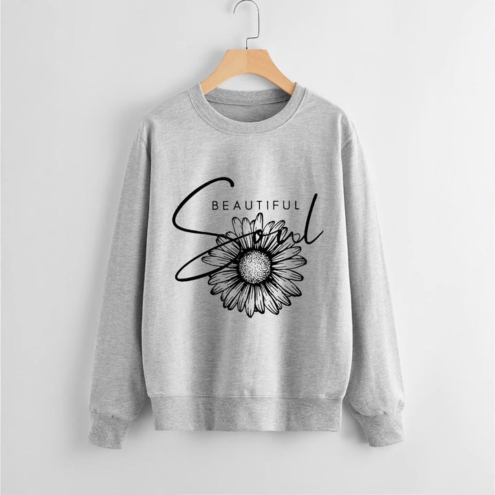 Kvindes sweatshirt med blomstermotiv og inspirerende tekst Stilla
