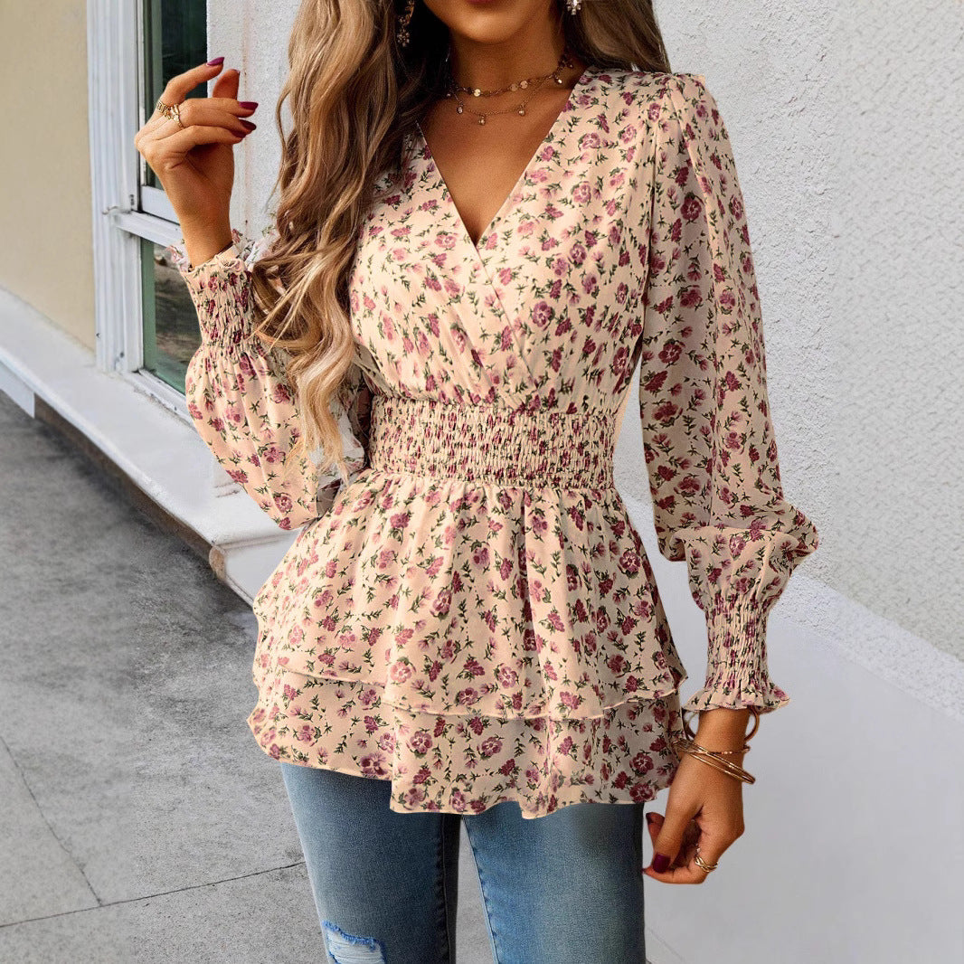 Damebluse med florale detaljer og elastisk taljeindsats Stilla