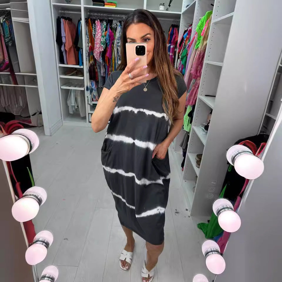 Dame fritidkjole med praktiske lommer og moderne batiklook Stilla