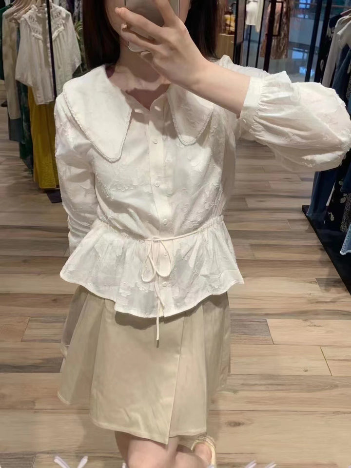 Dame Langærmet bluse med elegant spidemotiv og flæsedetaljer Stilla
