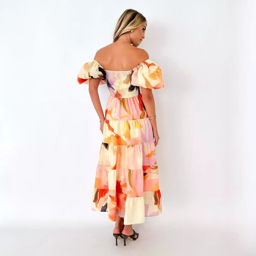 Kvinders maxikjole med off-the-shoulder design og voluminøse puffærmer Stilla