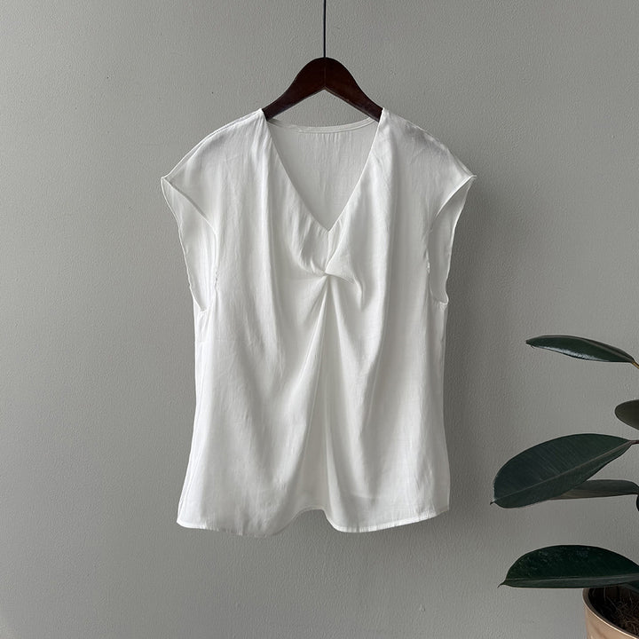 Damer afslappet knapdetaljer T-shirt med V-hals og løs pasform Stilla