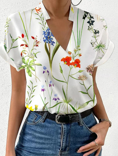 Damebluse med floralt design og moderne V-udskæring Stilla