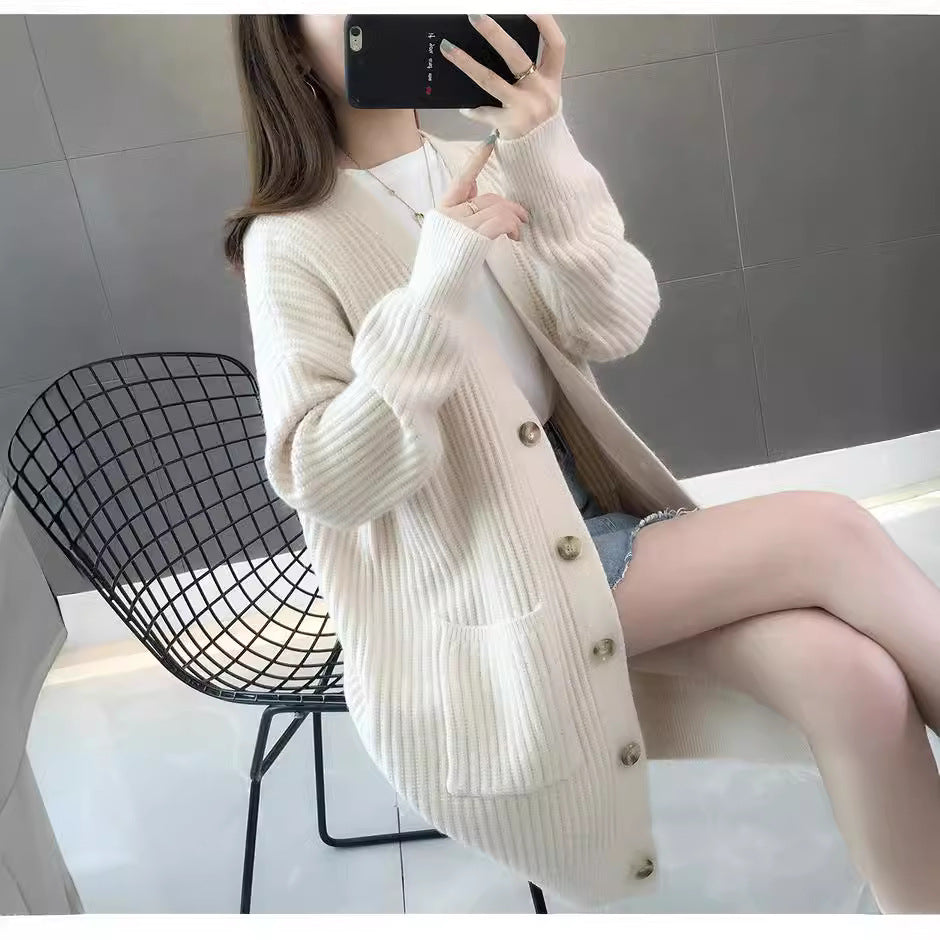 Kvinders cardigan med patchlommer og knapstolpe Stilla
