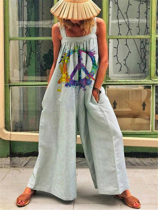Kvinde luftig Jumpsuit med farverigt blomsterprint og praktiske sidelommer Stilla