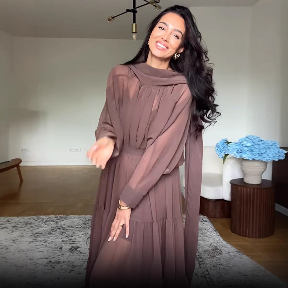 Dame maxikjole med transparente ruffles detaljer og elegant halterneck Stilla