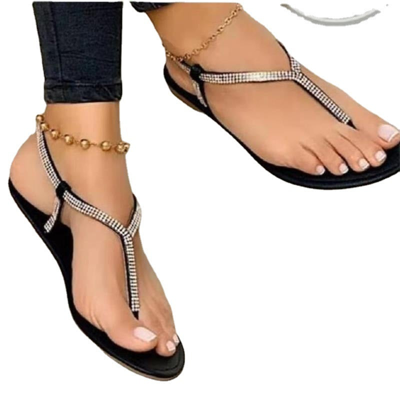 Dame elegante Tåsplit-sandaler med glitrende strass-applikationer Stilla