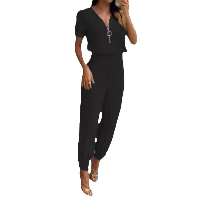 Dame jumpsuit med højhævet krave og sidelukning Skovae
