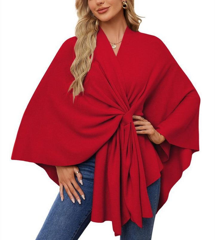 Dame elegant strikkeponcho med raffinerede draperinger og taljebælte Stilla