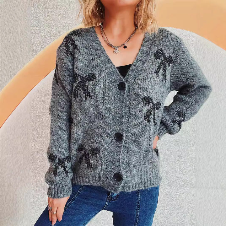 Kvinders cardigan med geometrisk ternet mønster og bløde materialer Stilla