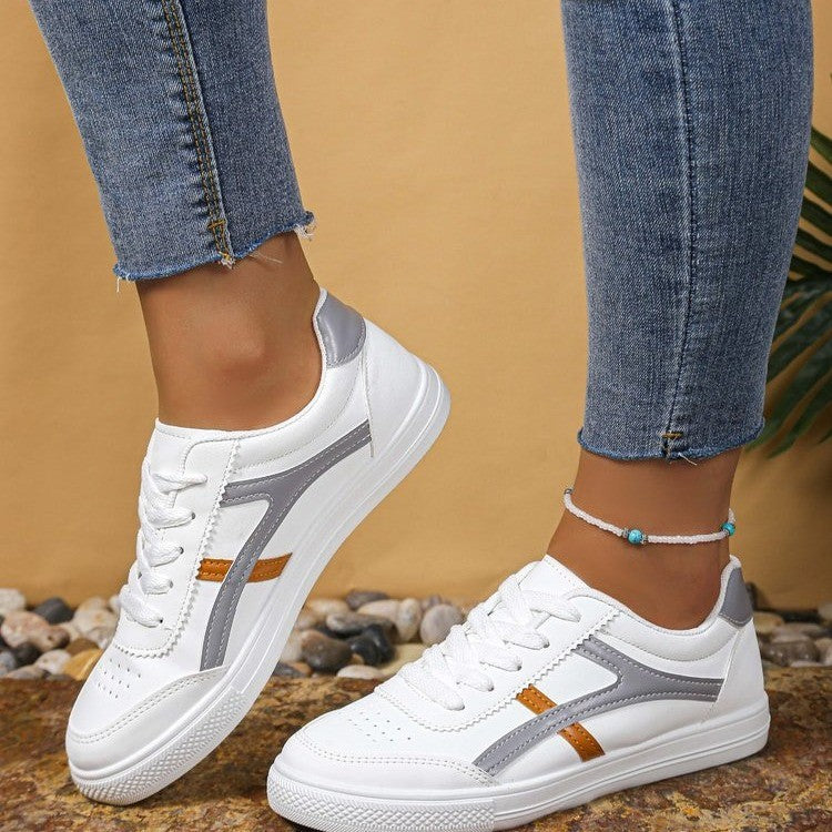Dame Sneakers med sporty design og modeaccent Stilla