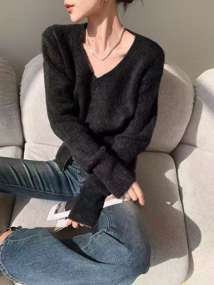 Damer fashionable cardigan med dyb V-hals og lynlås Stilla