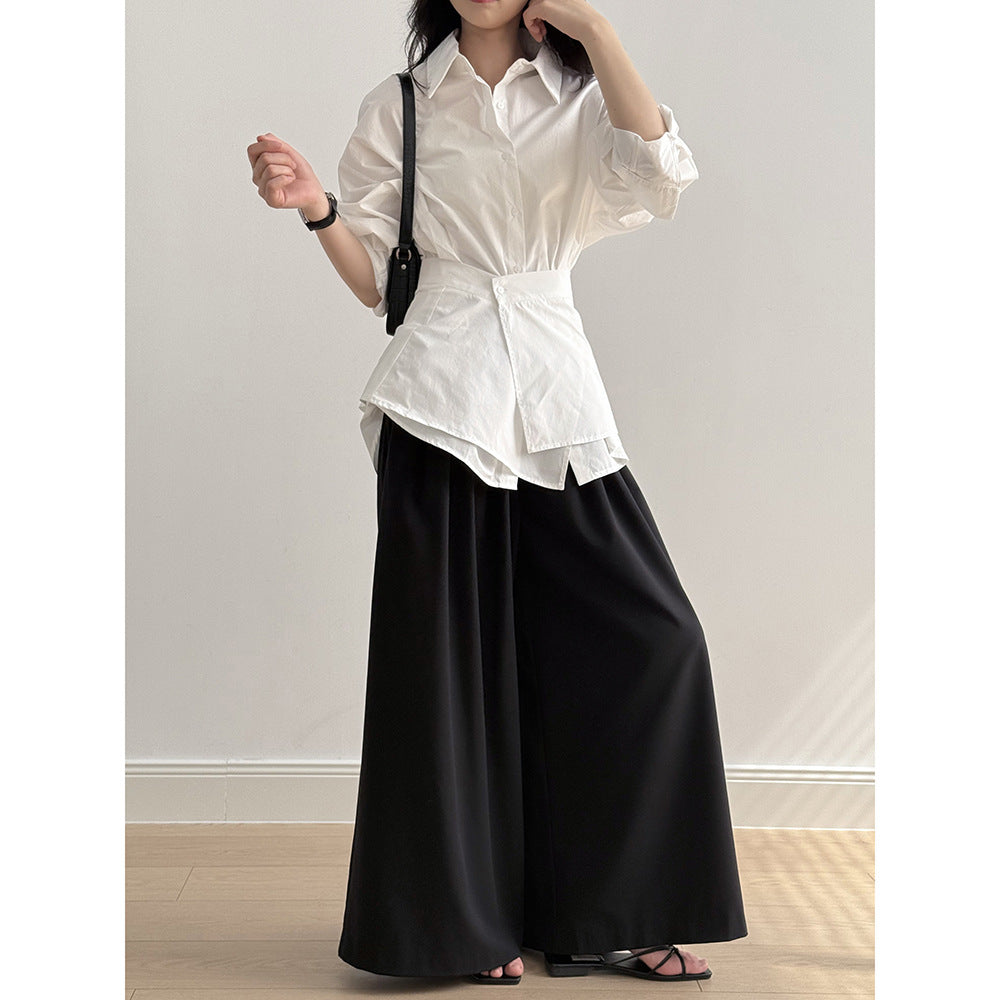 Damebluse med moderne omslagsdesign og elegante pufærmer Stilla