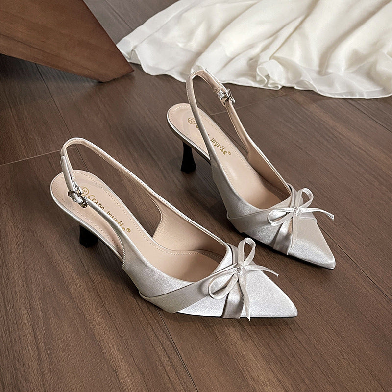 Dame Sling-Pumps med elegant sløjfedekoration og modeglans Stilla