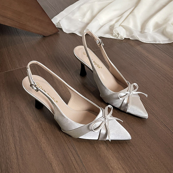Dame Sling-Pumps med elegant sløjfedekoration og modeglans Stilla