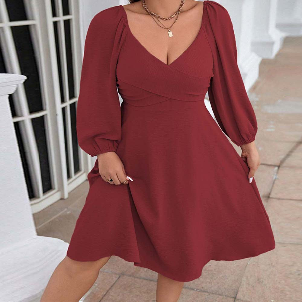 Dame Midi-kjole med elegant indviklingslook og puffærmer Stilla