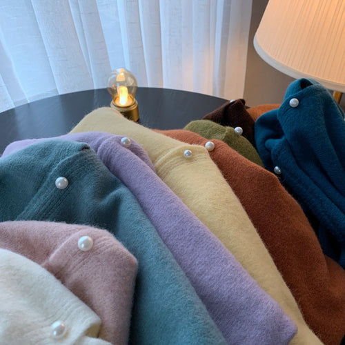Kvinders cardigan med elegante perleknapper og moderne design Stilla