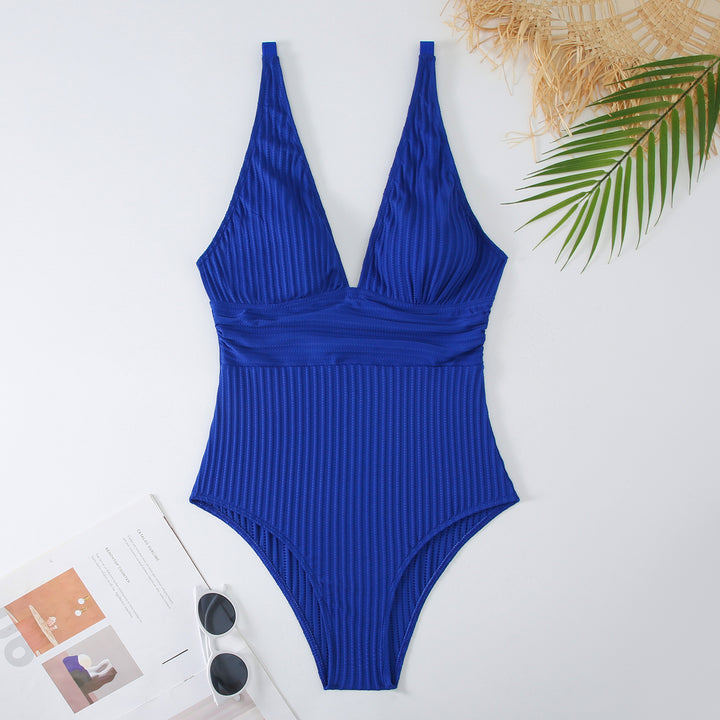 Dame onepiece badedragt med sporty ribbemønster og dyb V-udskæring Stilla