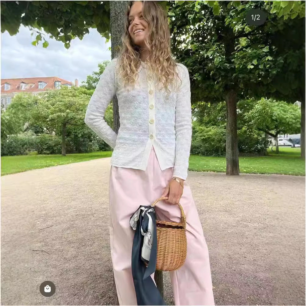 Damer strikjakke med elegant krave og fine knapdetaljer Stilla