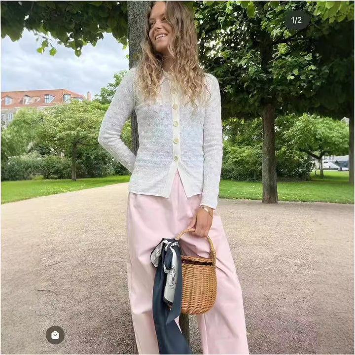 Damer strikjakke med elegant krave og fine knapdetaljer Stilla