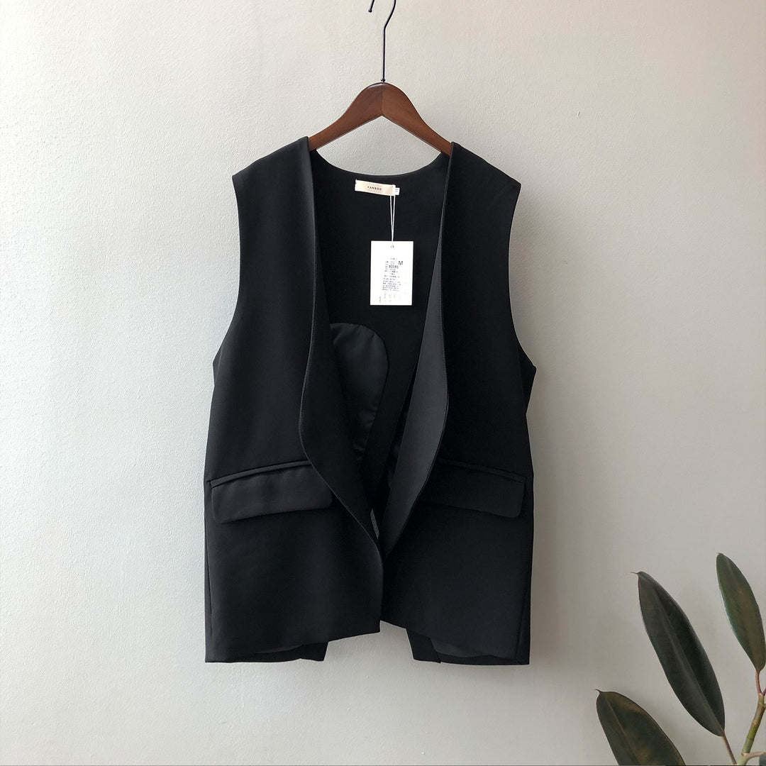 Dame elegant vest med dyb V-udskæring og praktiske lommer Stilla