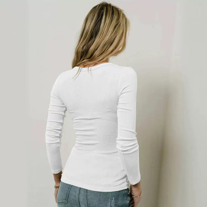 Dame langærmet bodystocking med dyb V-udskæring og fin ribstrik Stilla