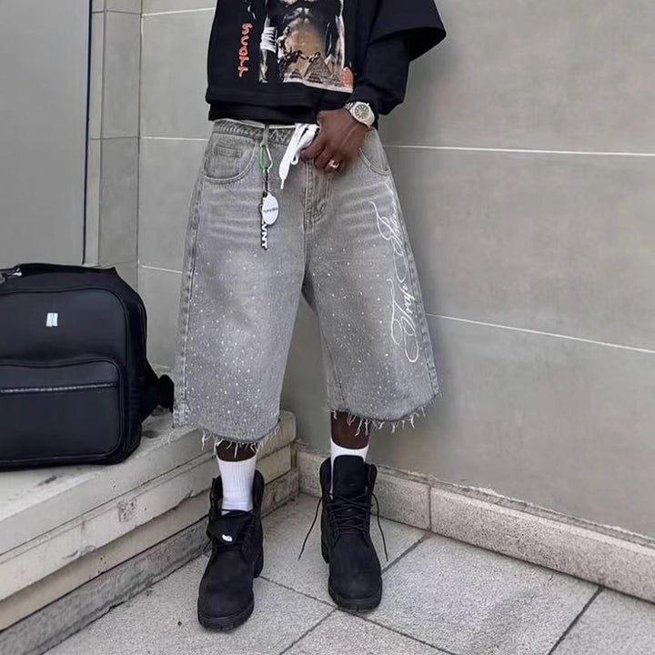 Herre afslappede denim shorts med frynset kant og grafisk tryk Stilla