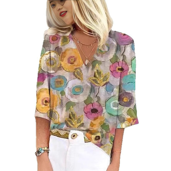 Dame V-hals bluse med blomsterdesign og rummelig pasform Stilla