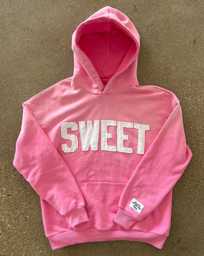 Unisex nan weit gesnit hoodies med påsyede bogstaver og kængurulomme Skovae