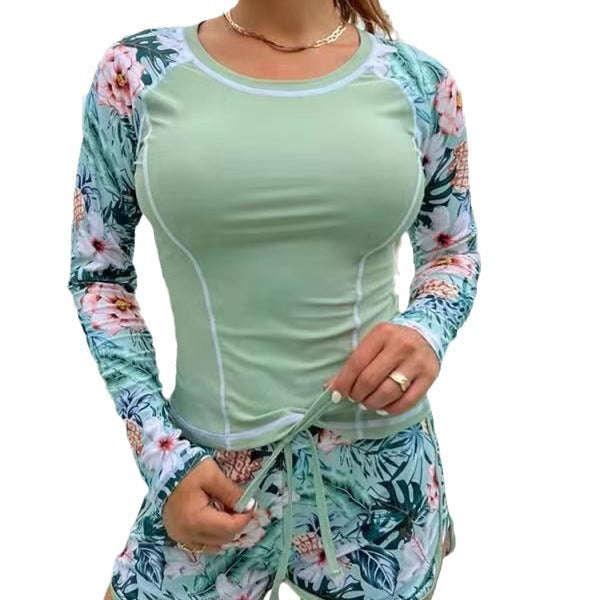 Dame Sporty Langærmet Badetop med blomsterdesign og Shorts Skovae