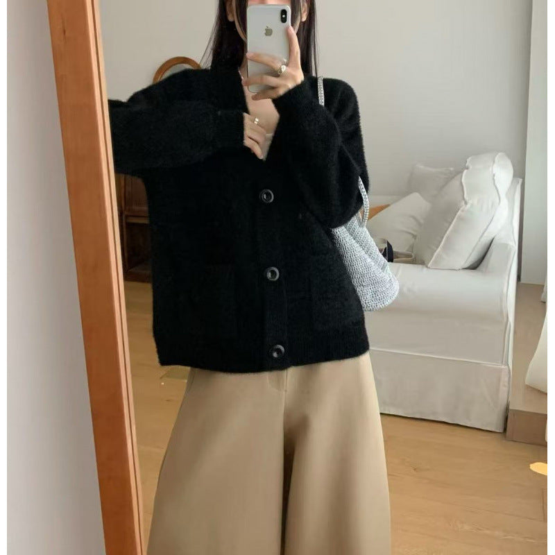 Kvinders fluffy knap cardigan med elegante lommer Stilla