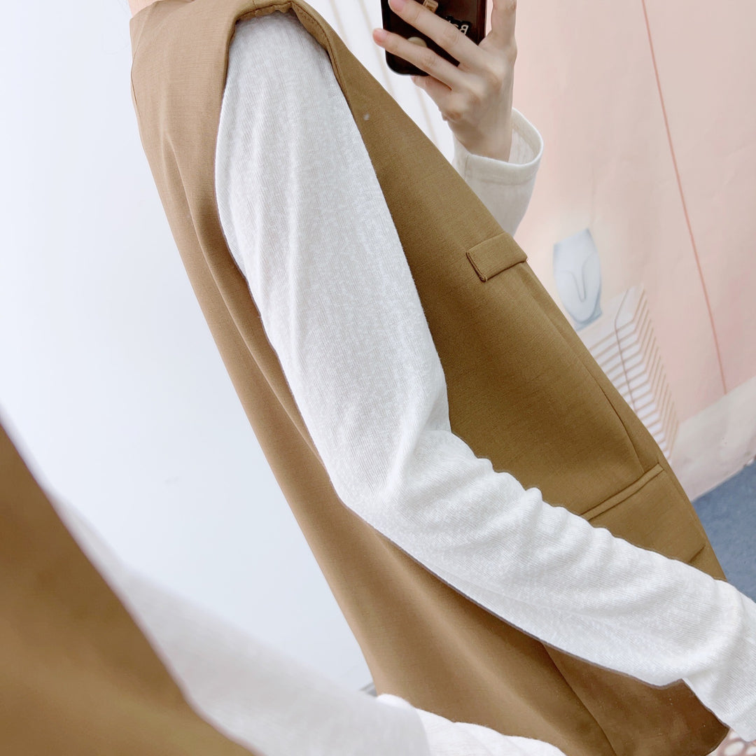 Dame elegant vest med minimalistisk design og praktiske lommer Stilla